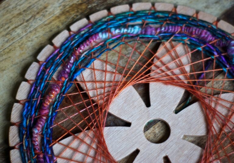 Yarn woven inside of a circular loom.